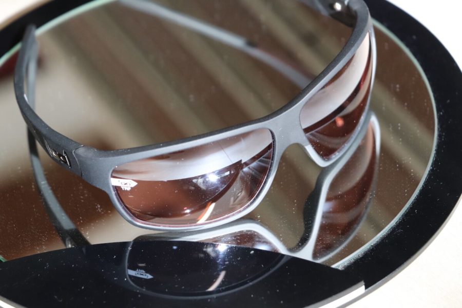 Sonnenbrille von Gloryfy mit grauem Rahmen und braungetönten Gläsern
